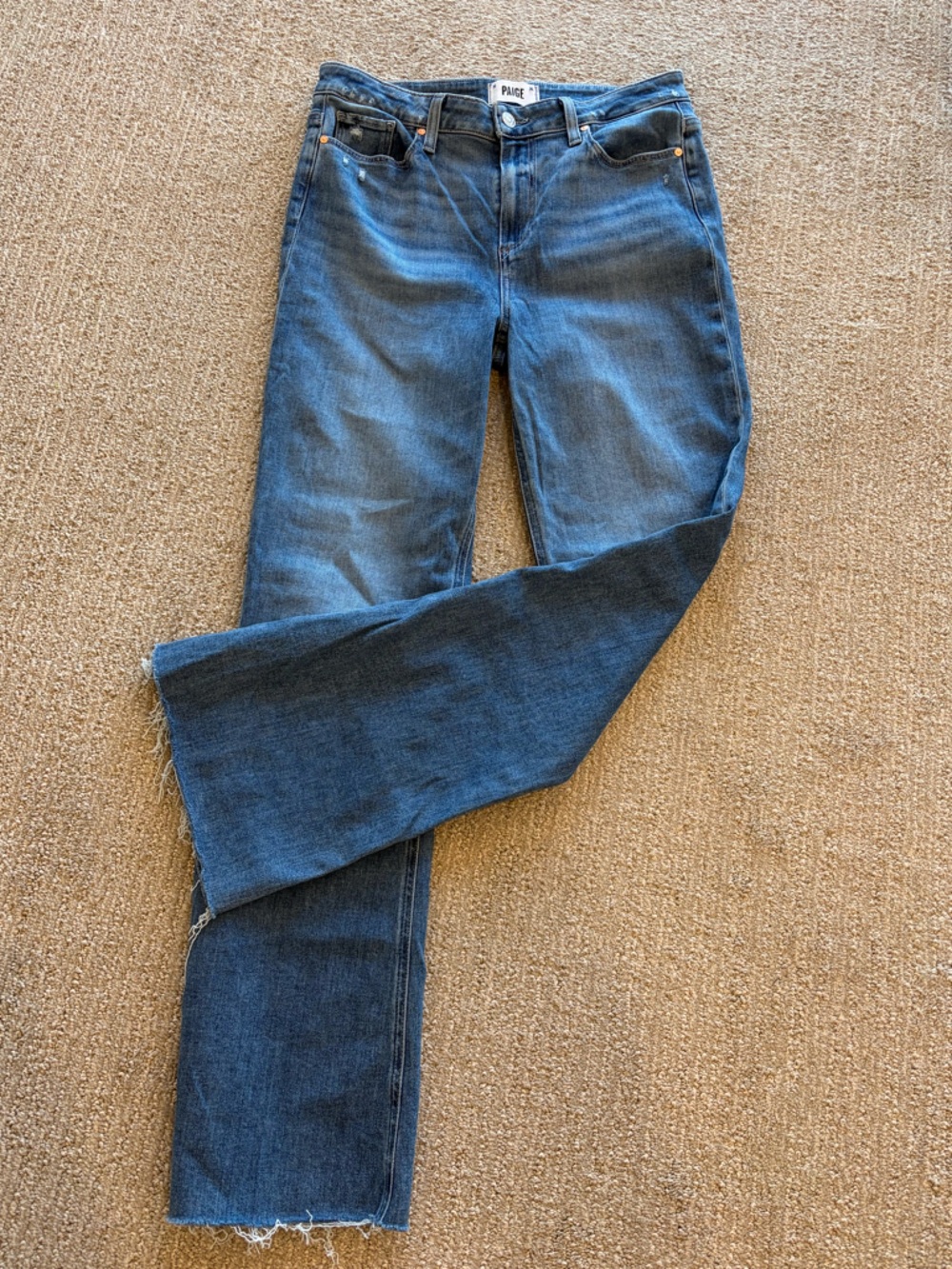 PAIGE NEW CONDITION ‘High Rise Laurel Canyon” Jeans with Raw hem. Size 29